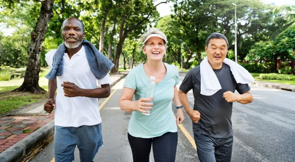 three people jogging