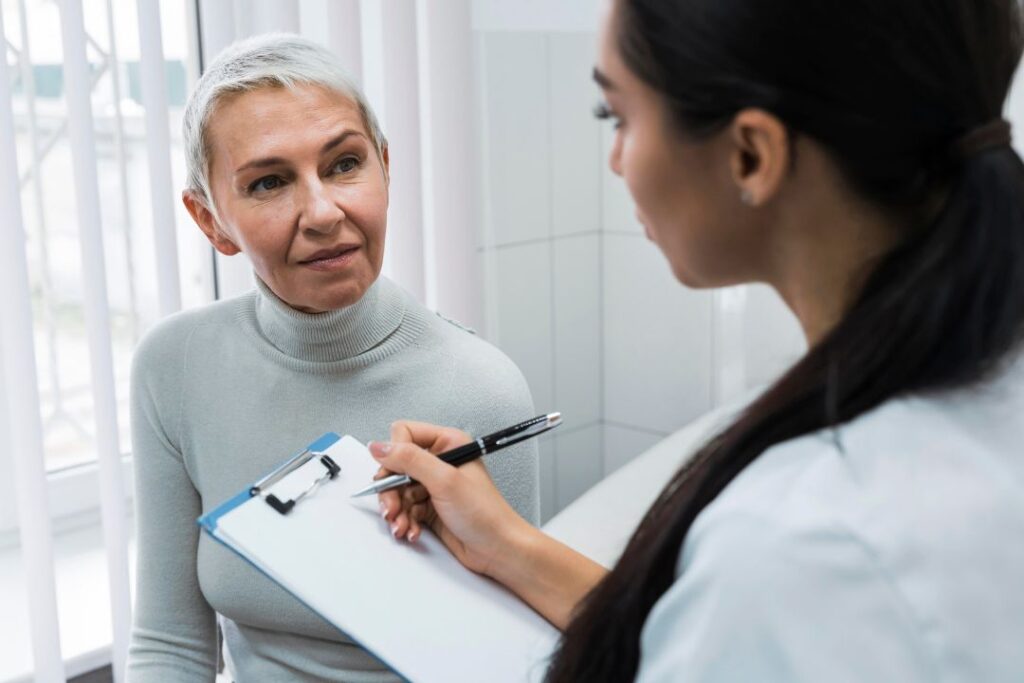 Female patient meeting with female doctor to review progress.