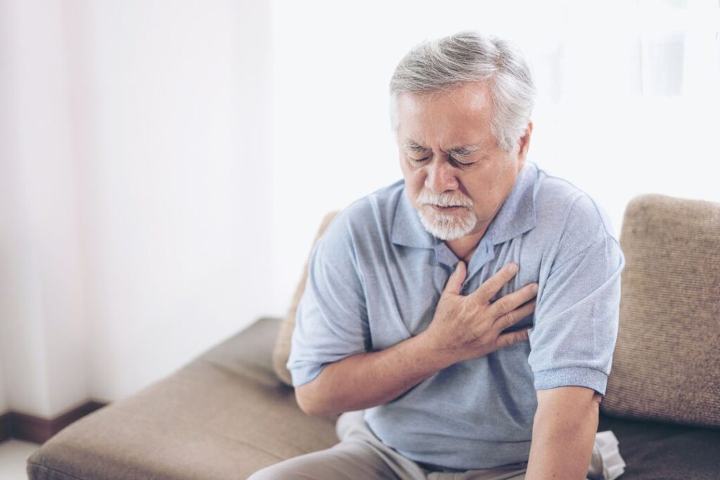 Man feeling chest pain.