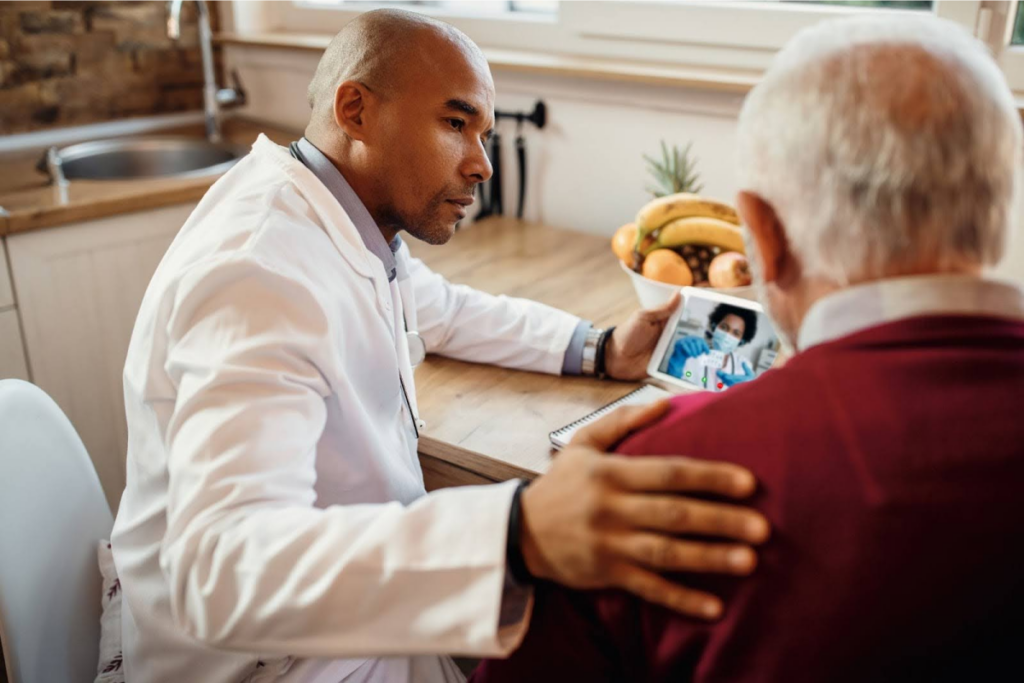 Doctor comforting an elderly patient.